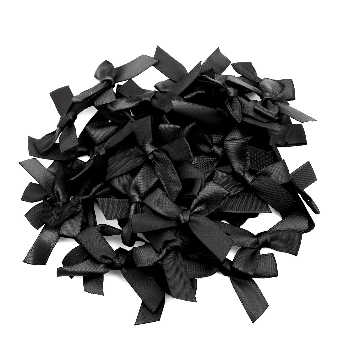 A pile of black satin ribbon bows for craft and decoration.
