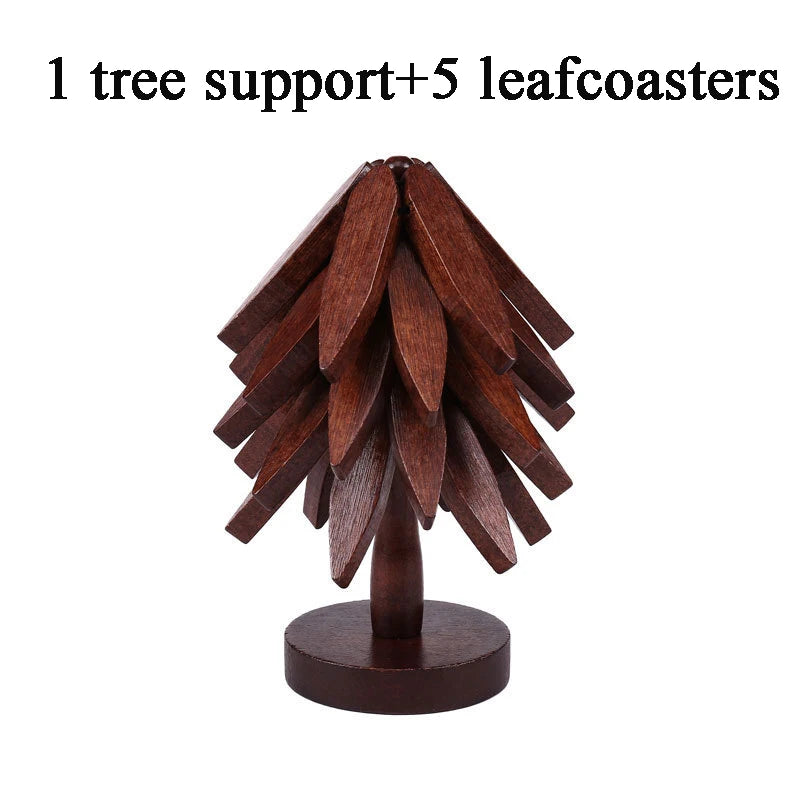 A wooden tree support with five leaf coasters made of dark brown wood.