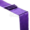 Purple luxury satin table runner draped elegantly for weddings and events