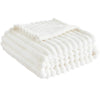 A stack of white, fluffy flannel throw blankets rolled and folded.