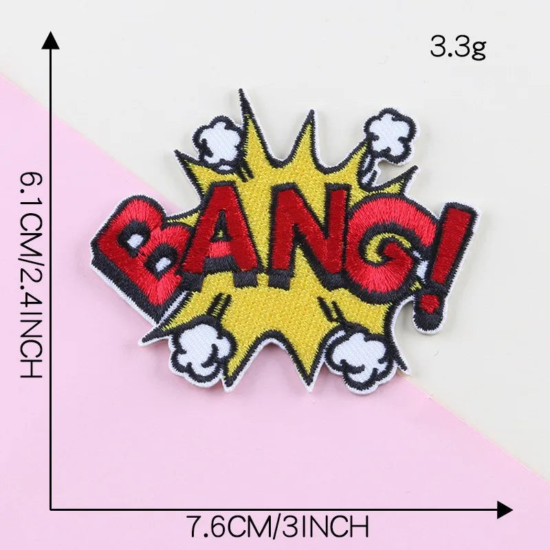 A yellow and red embroidery patch with the word BANG in large letters surrounded by stars and smoke clouds.