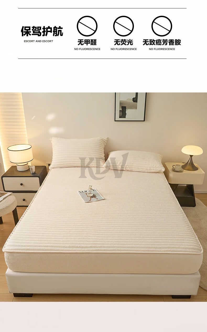 A white fitted bed sheet set with a quilted texture is displayed on a bed, next to warning labels.