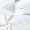 Close-up view of a white decorative pillow cover with a subtle highland cow print texture.