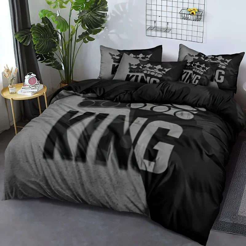 A black and grey king size duvet cover set with pillows featuring a large KING graphic.