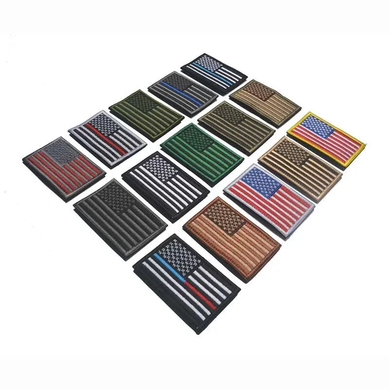 A collection of USA flag patches with hook and loop backing arranged in a diamond pattern.