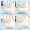 White quilted soft cooling pillows with gold accents for newborns and babies