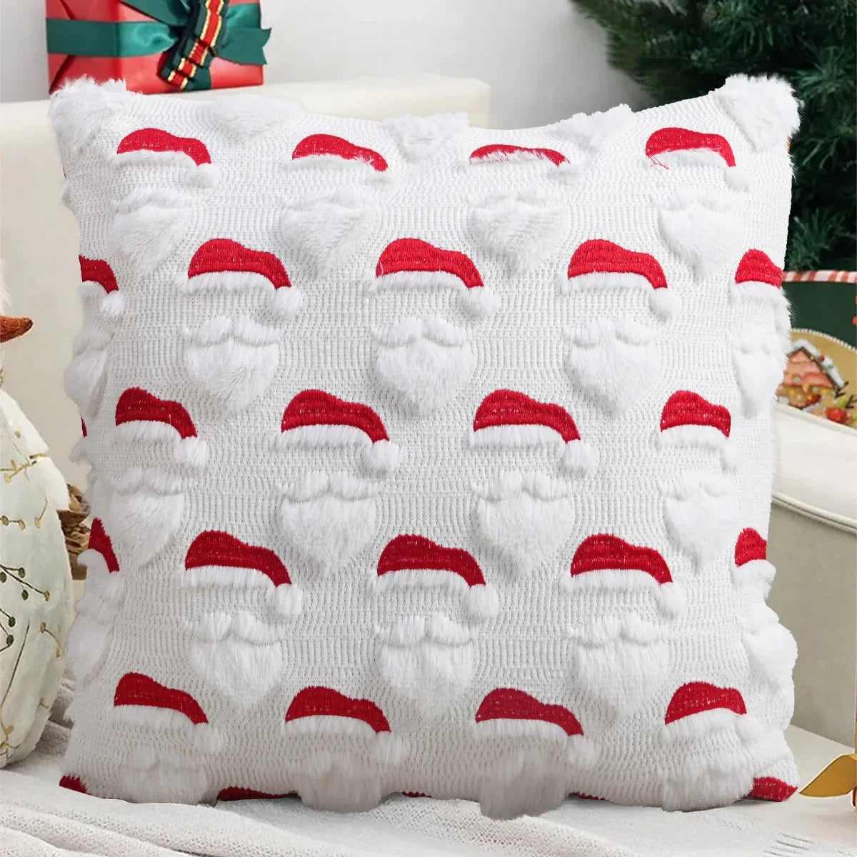 White knitted cushion cover with red Santa face patterns for Christmas decoration