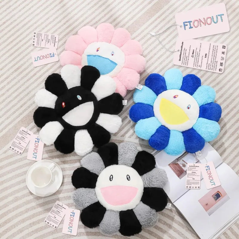 A collection of cozy sunflower plush cushions in various colors including pink, black, white, and blue.