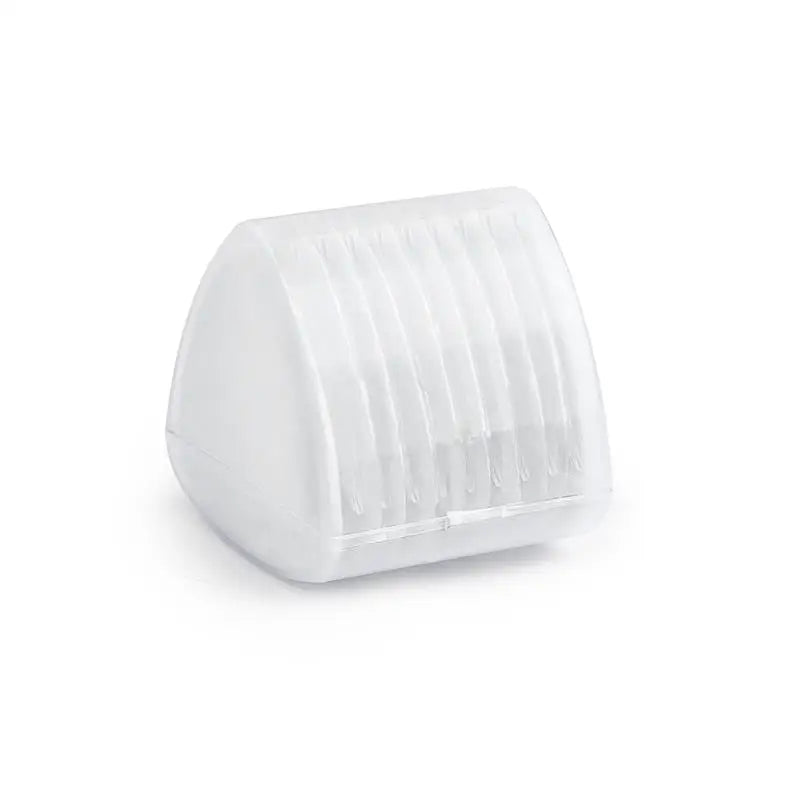 A white plastic eraser with ribbed texture used for fabric chalk markers.