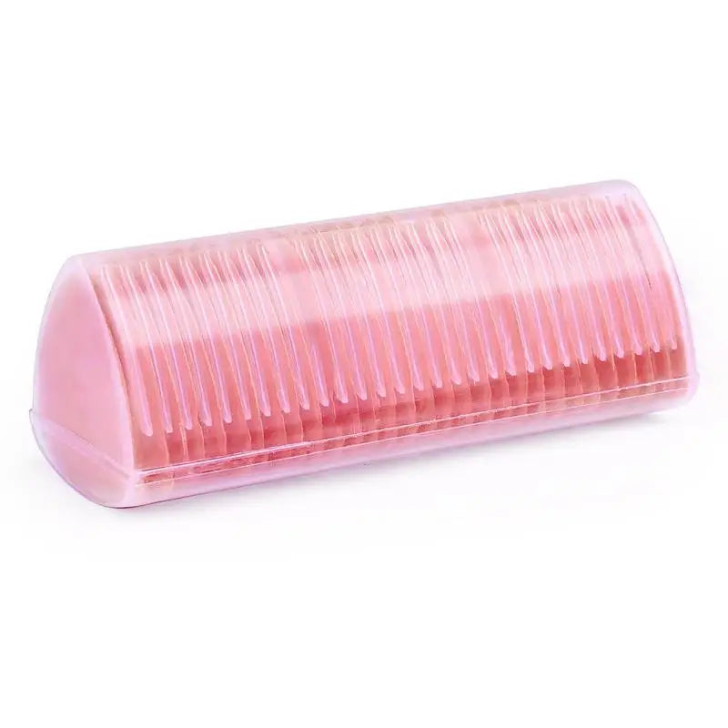 A clear pink silicone eraser tool used for fabric chalk markers or sewing tools.