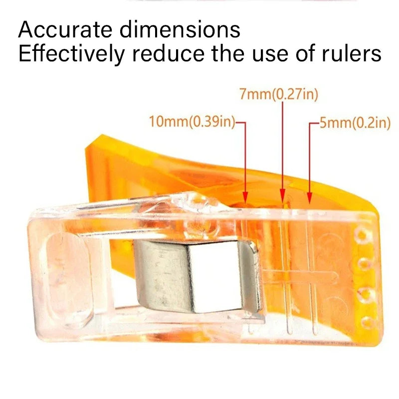 A close-up of colorful plastic sewing clips used for measuring and marking, showing various dimensions.