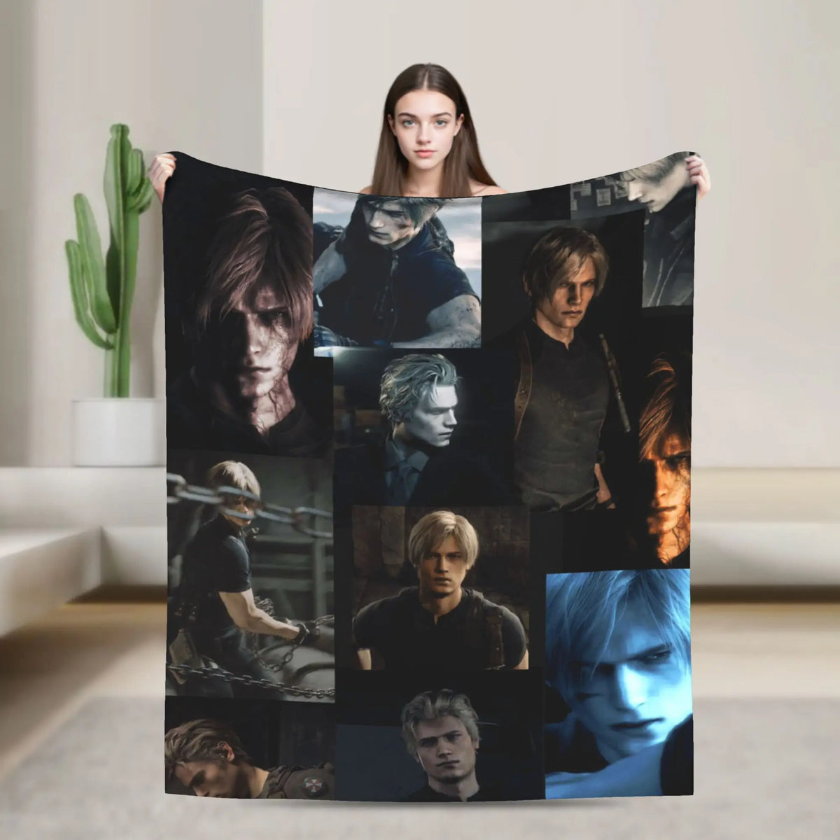 A woman holds up a black graphic throw blanket featuring multiple dark, moody portraits of male characters.