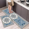 A set of two diamond print non-slip waterproof kitchen rugs featuring blue and white patterns on a light wood floor.