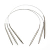 A set of stainless steel circular knitting needles, including a long needle and several smaller points.