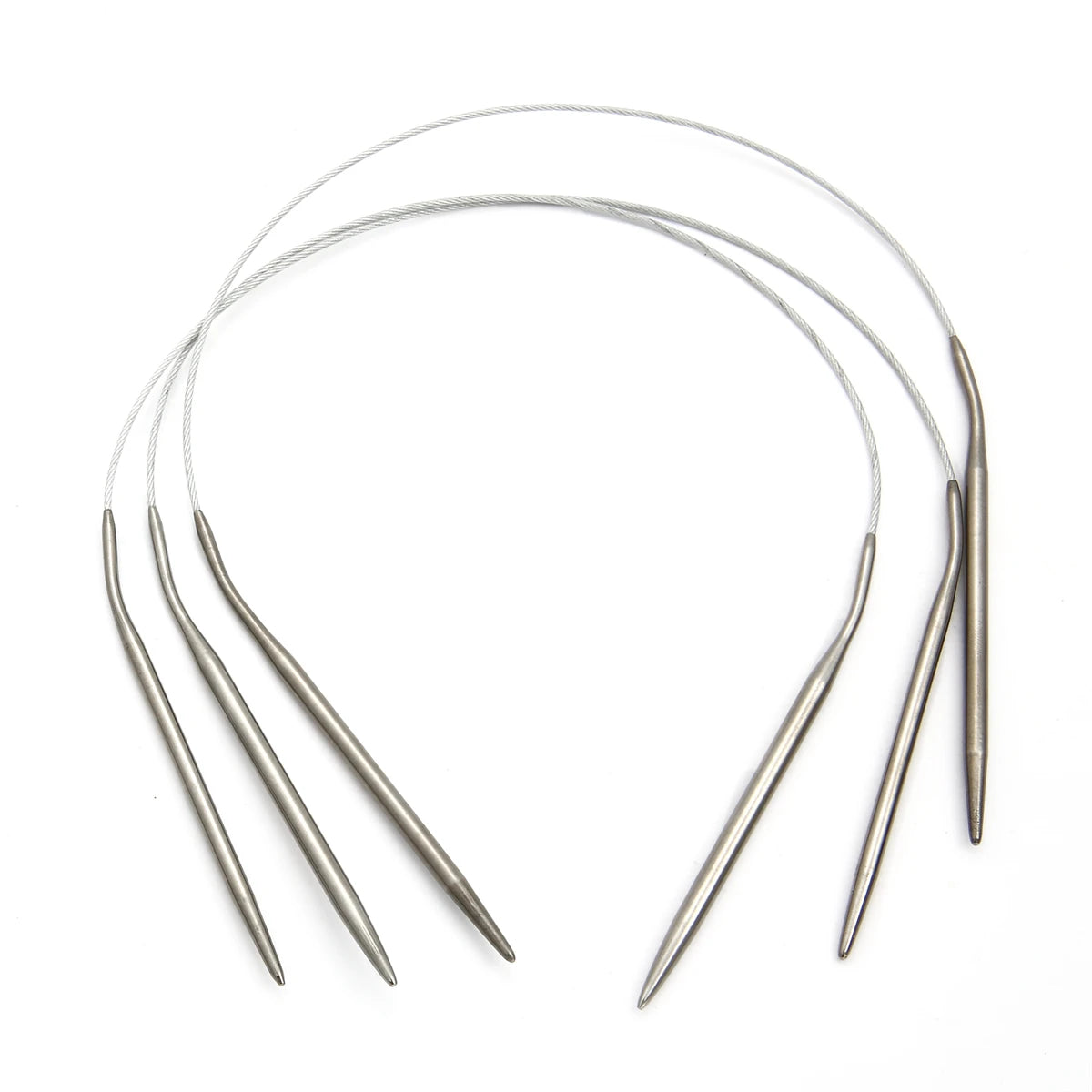 A set of stainless steel circular knitting needles, including a long needle and several smaller points.