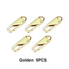 Five gold metal zipper sliders or repair kits.