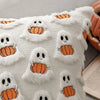 White knitted throw pillow cover with orange pumpkin and ghost embroidery pattern