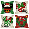 Four festive pillow covers featuring Christmas and holiday designs including Santa, bows, and wreaths.