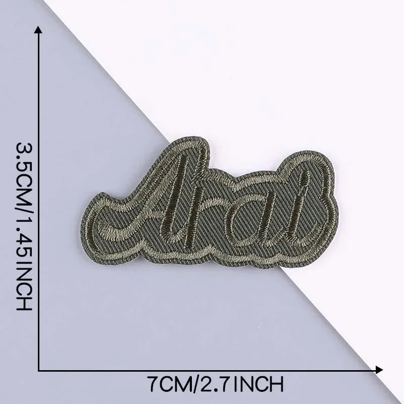 A set of five black embroidered leather patches with self-adhesive backing shown against a white background.