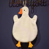A fluffy white cartoon goose hanging hand towel with an orange beak and yellow feet.