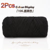 A spool of black reusable elastic yarn used for crafting.
