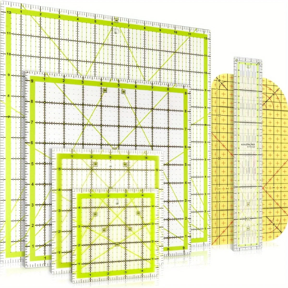 A set of acrylic quilting rulers, including four sizes and an ironing ruler, laid out on a white surface.