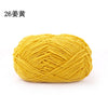 A ball of bright yellow 3mm matte chenille yarn for knitting and crochet.
