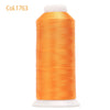 A spool of bright orange embroidery thread labeled Col.1763