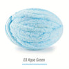 A ball of light blue aqua green extra thick hand-knitted yarn for crafting and gifts.