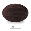 A ball of dark brown, extra thick hand-knitted yarn for crafting and gifts.