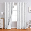 White curtain featuring a marble print with silver stamping hanging in a window.