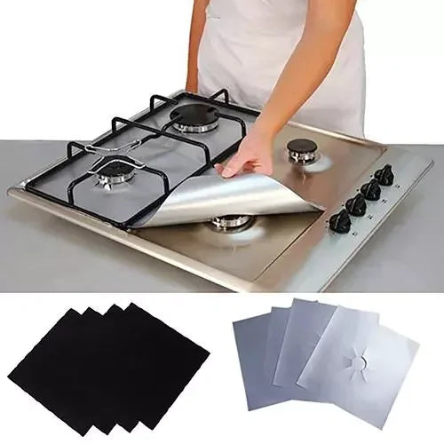 Set of reusable gas hob protector liners in black and white.