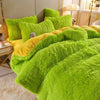 A bright lime green plush mink velvet duvet set with yellow accents on a bed.
