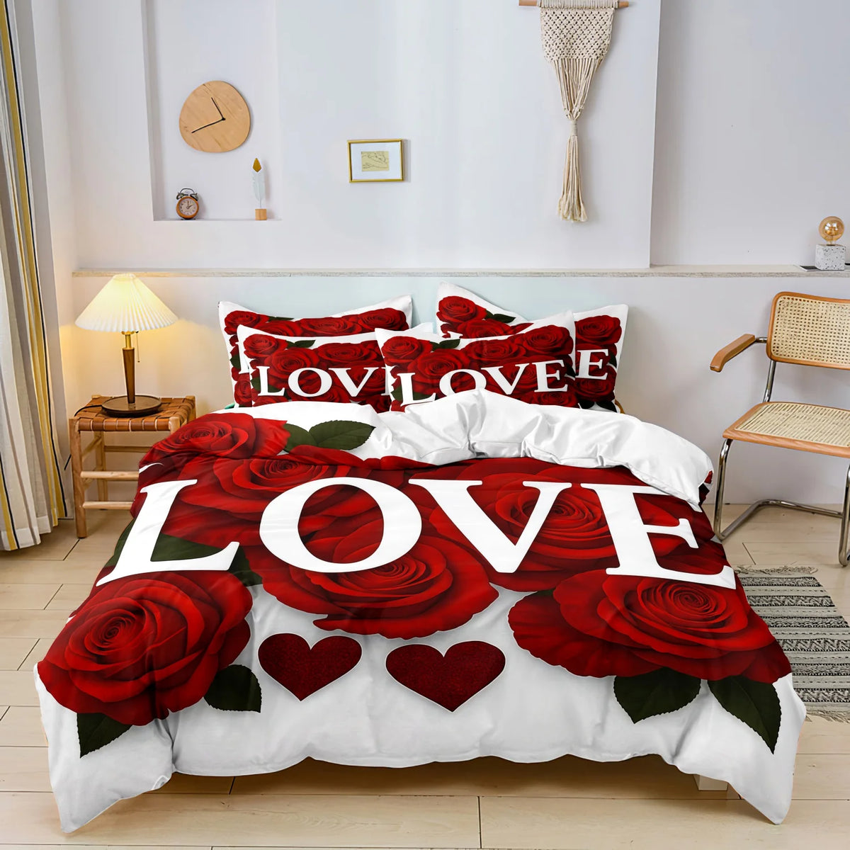 A red rose floral bedding set featuring the word LOVE printed on a white duvet cover.