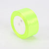 A roll of neon yellow satin ribbon for crafts and gift wrapping.