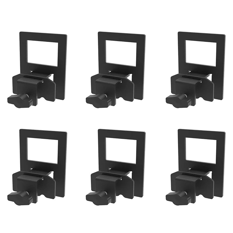 Four views of black extra-thick mattress slide stoppers designed for bed frames.