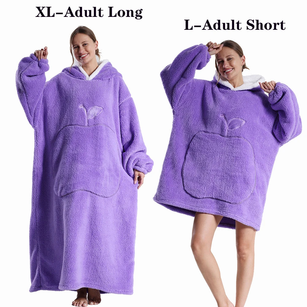A woman models a purple XL adult long fleece blanket hoodie and an L adult short fleece blanket hoodie.