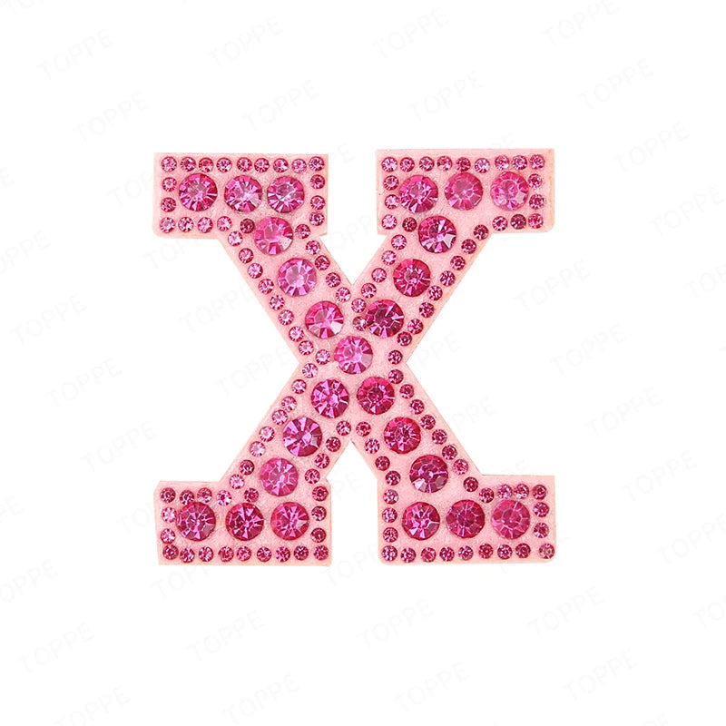 Pink rhinestone letter X patch for DIY craft project