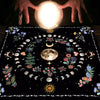 A dark mat featuring a full moon, crescent moons, floral elements, and a sun design for tarot readings.