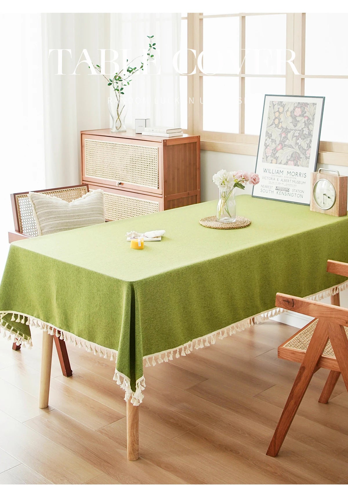 A lime green table is set with white floral arrangements and textured cotton tassel table runners.