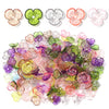 A collection of resin flower bead caps in various shades of pink, green, purple, and clear for jewelry making.