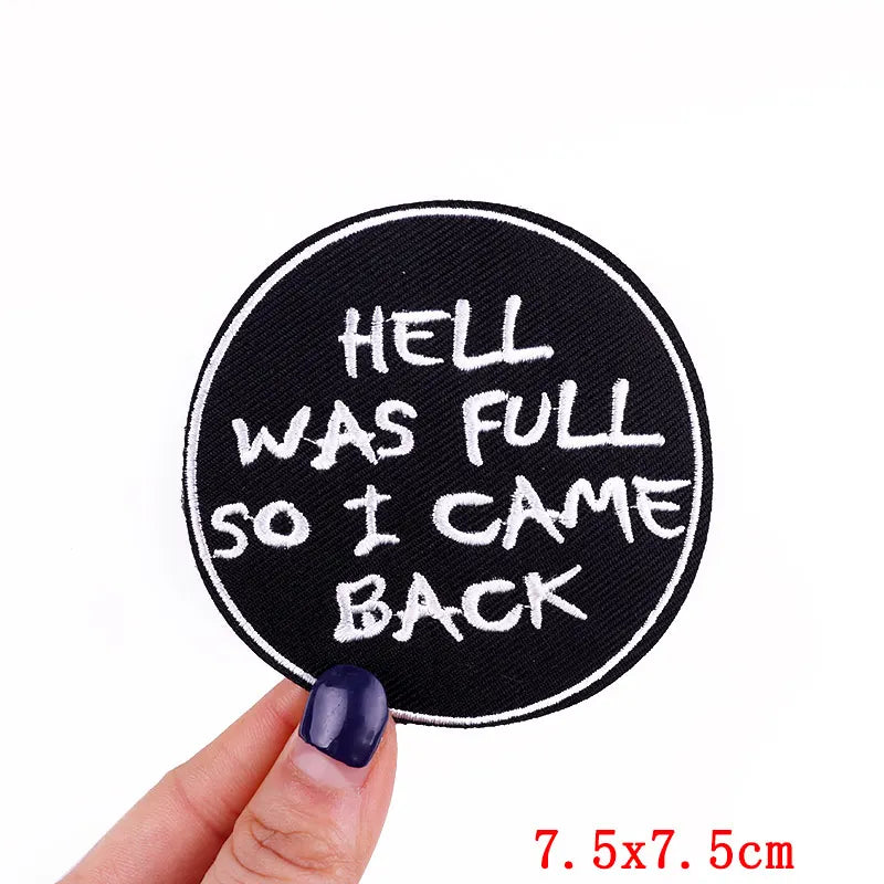 Black embroidered patch with white text that reads Hell was full so I came back
