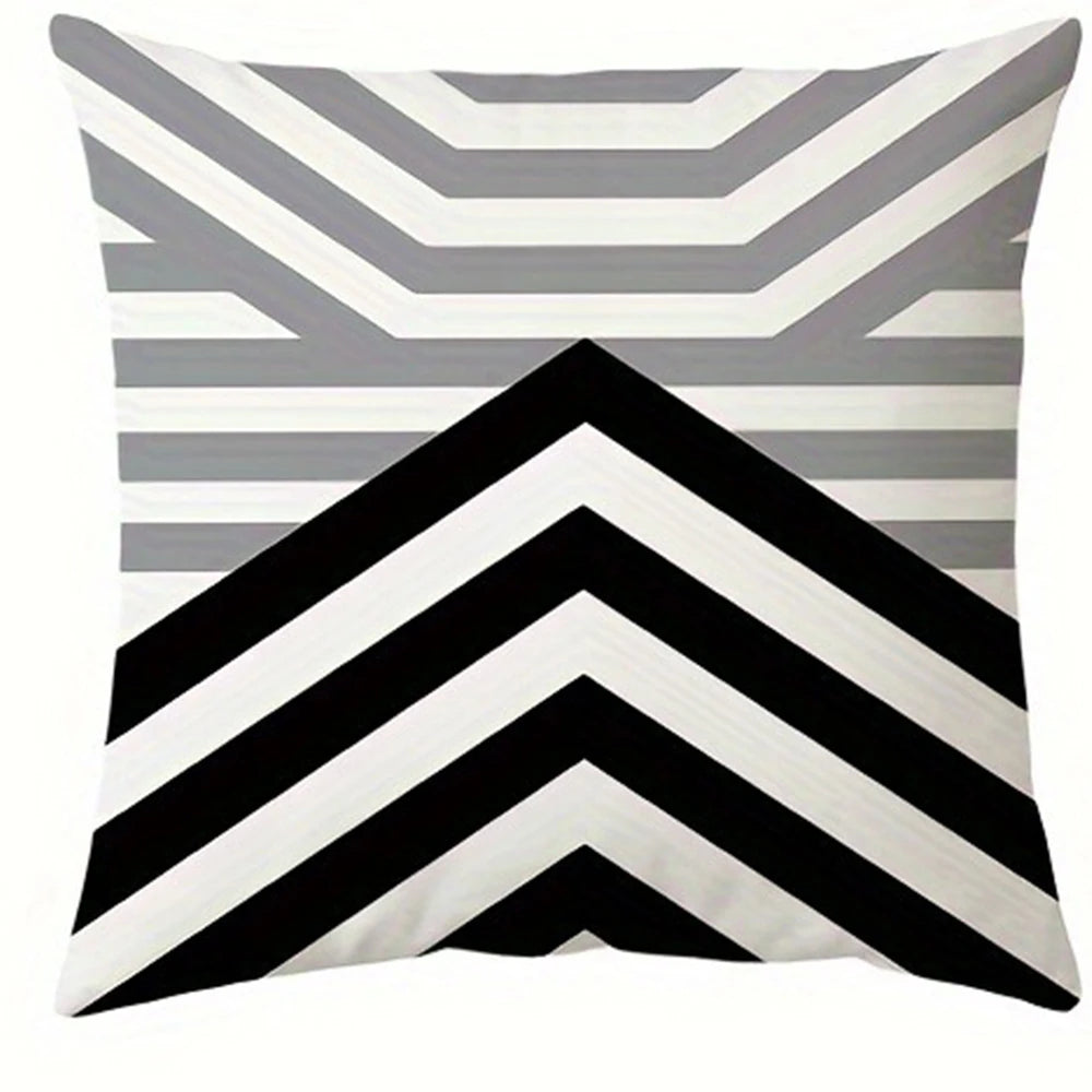 Square pillowcase cover with a modern geometric pattern of black and white diagonal stripes.