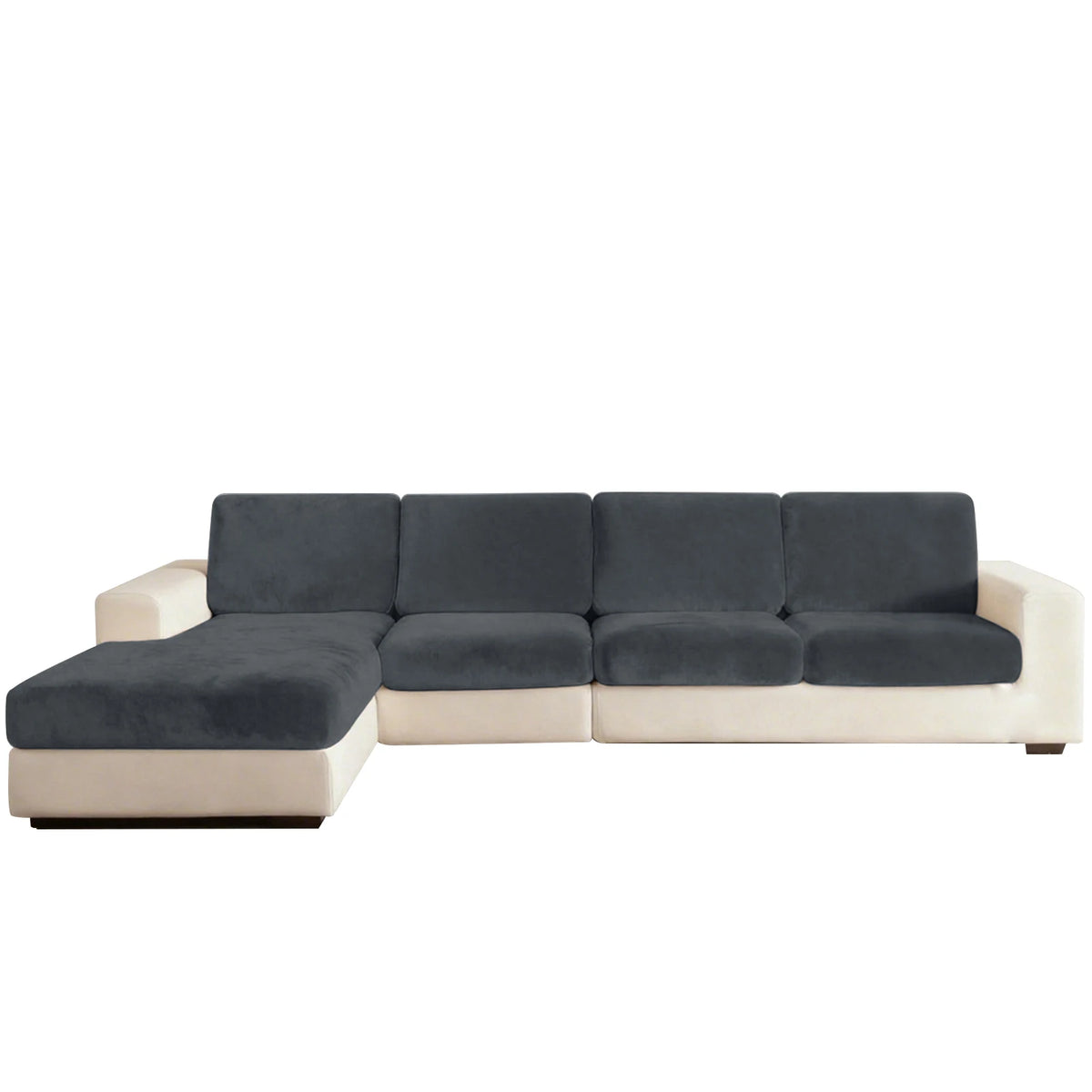 A modern, sectional sofa upholstered in dark gray fabric with cream-colored trim and seat cushions.