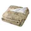 A beige blanket with a faded map design featuring Lord of the Rings elements.