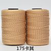 Spool of tan hand knitting and crochet cord for crafting