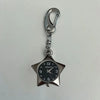 Silver star-shaped pocket watch keychain with a chain and adjustable clock face