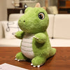 A cute green dinosaur plush toy with white stripes sitting on a wooden table.