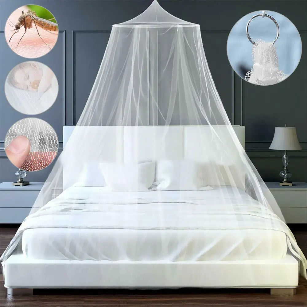 White lace dome mosquito net canopy draped over a bed for protection