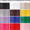 A collection of twelve assorted colored polyester sewing threads in various shades including black, white, gray, brown, yello
